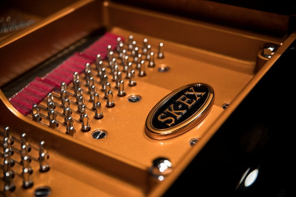 Shigeru Kawai SK-EX Logo