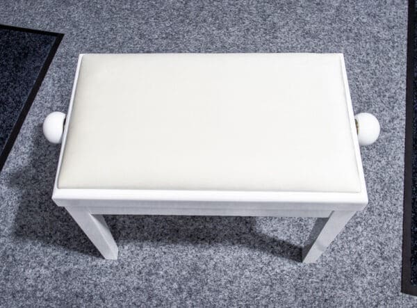 white piano stool